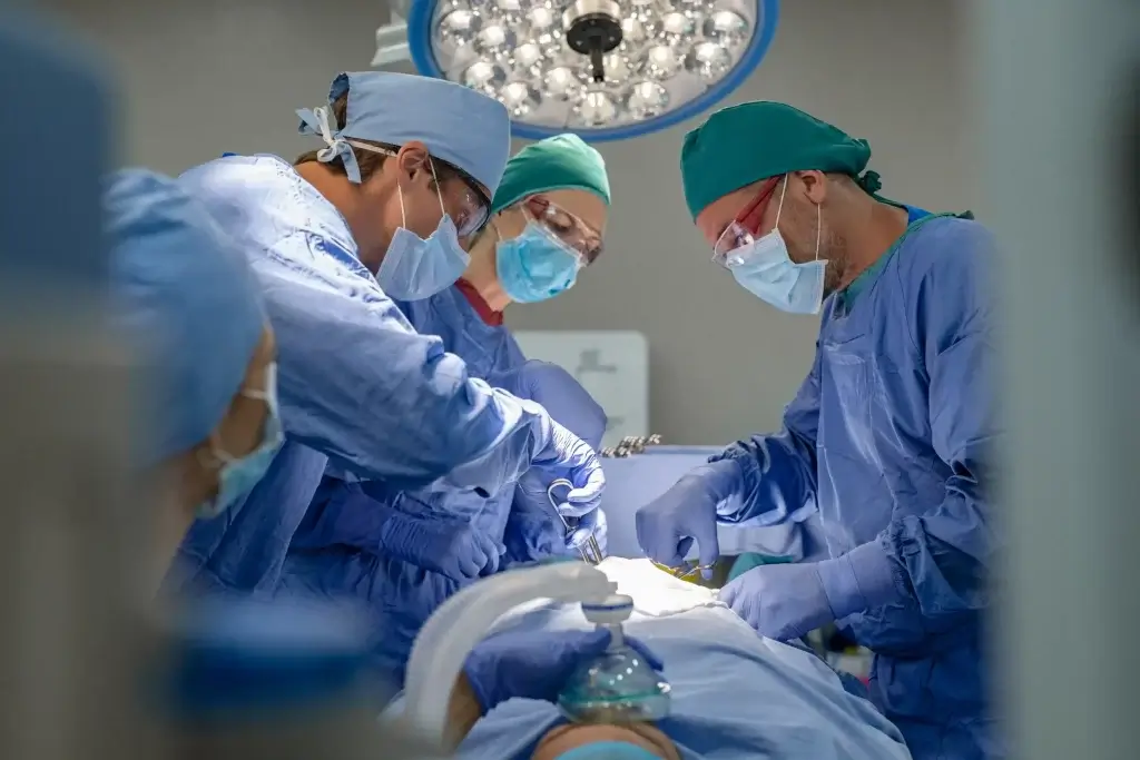 Team of surgeons performing surgery 